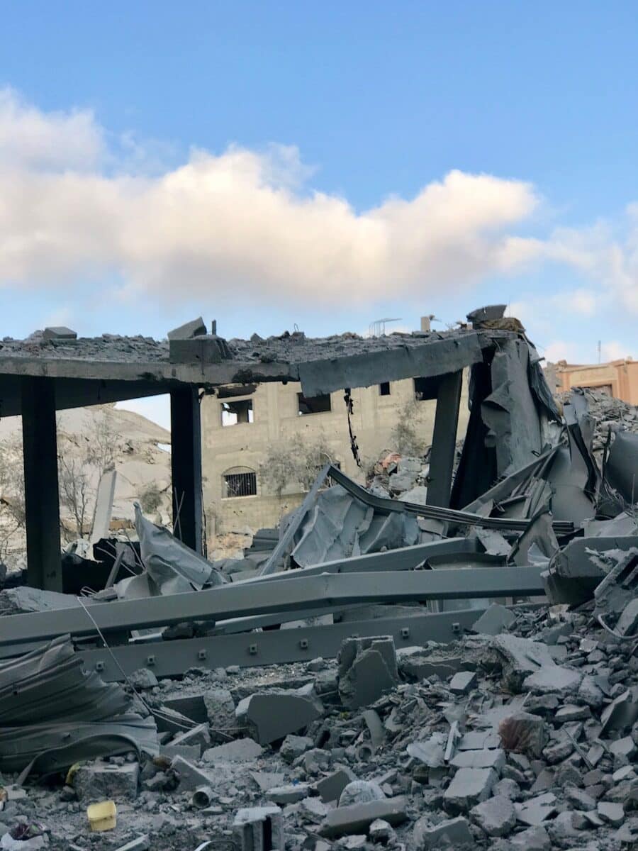 A large pile of rubble next to a building