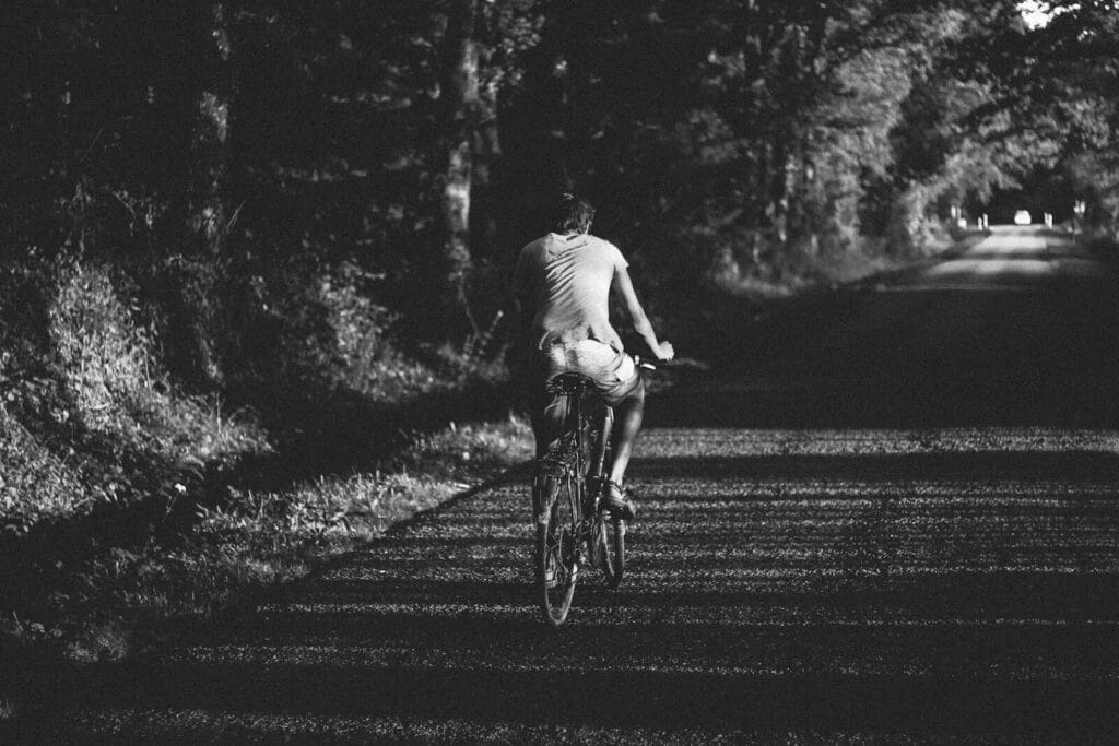 man riding on bicycle